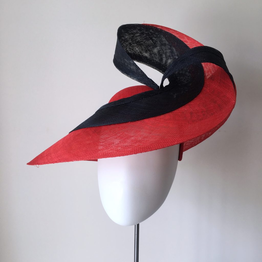 Sculptural red and blue sinamay hat